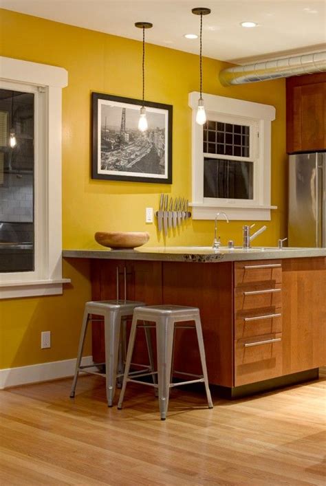 Creating A Bright Space Yellow Kitchen Walls With Oak Cabinets