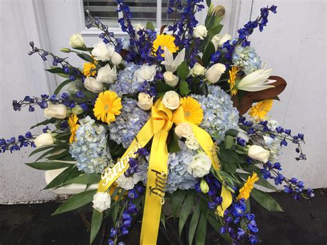 Casket Spray Blue White Yellow By Landmark Florist