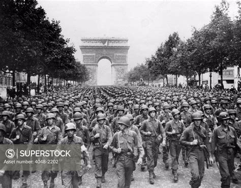 World War Ii American Troops Marching Down The Champs Elysees
