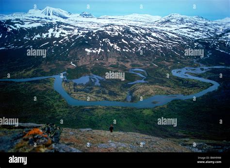 Hiker Trekking Or Backpacking In The Scandinavian Mountains Of Sweden