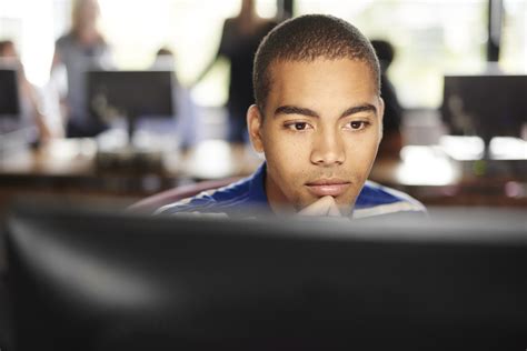 Student In Classroom At The Computer Nnpa Essa Media Campaign