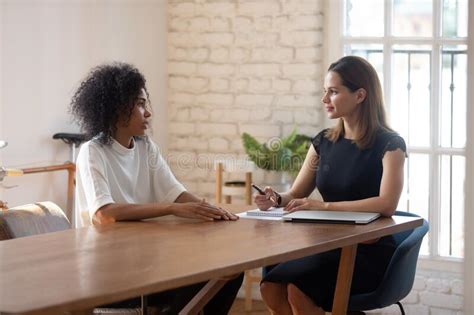 Candidates are going to try to pry an offer out of the interviewer, and the interviewer's job is to hold onto it. Confident Caucasian Male Applicant Answering On Questions ...