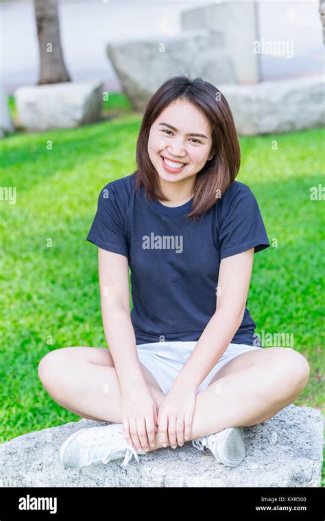Single Asian Women Teen Cute Short Hair Friendly Smiley In The Green Park Relax And Smile Stock