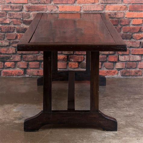 The bin area is operating under normal conditions with customers and staff to practice social distancing. Antique Spanish Colonial Hardwood Dining Table from the Philippines For Sale at 1stdibs