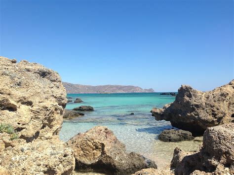 Elafonisos Lagoon In Crete Crystal Clear Water And Pinky Sand