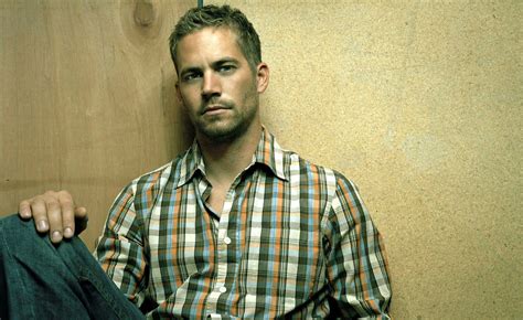 Download Paul Walker In His Iconic Blue Shirt And Jeans