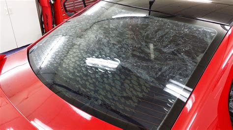 Peel off and apply the tint: Removing Car Window Tint - Ultra Tint - Window Tinting Gold Coast