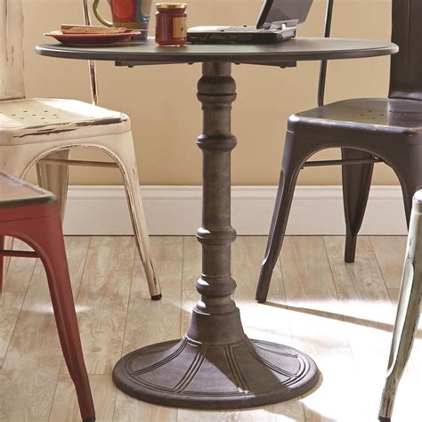 You never know when guests decide to pop by, and just in time for dinner. Oswego Industrial Round Bistro Pedestal Dining Table from ...