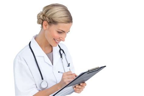 Premium Photo Smiling Nurse Writing On Clipboard