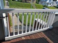 Dress up your deck and add security with a gate. Make a Rolling Gate for Your Porch | DIY- Do it yourself ...