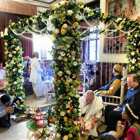 Explore the essential south indian wedding rituals and their significances. Indian wedding Mandap - Lime, cream, yellow flowers with ...