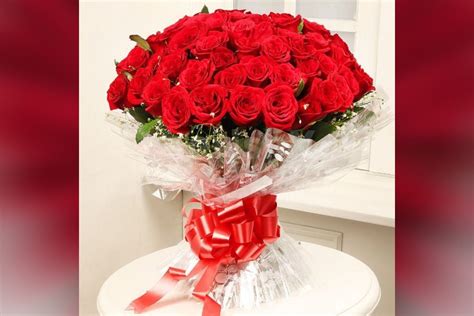 Buy 50 Red Roses Blooming Bouquet Online And Get Them Delivered For