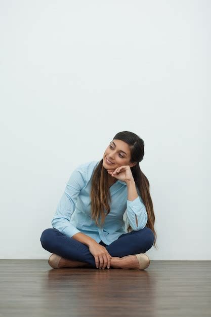 Smiling Relaxed Beautiful Woman Sitting On Floor Photo Free Download