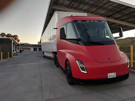 Two concept vehicles were unveiled in november 2017, and production in 2021 is planned. We present to you the 'Red Tesla Semi Truck' HD Photos