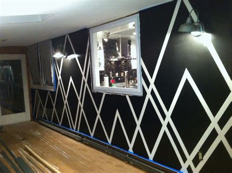 Draw the silhouette of a city with black washi tape and you'll feel like designers call them statement walls or temporary installations for parties, but we. how to do designs on walls with painters tape - Google ...