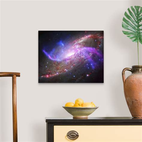 A Galactic Light Show In Spiral Galaxy Ngc 4258 Wall Art Canvas Prints