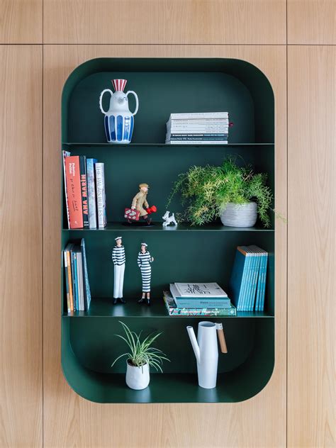 The Shelving In This Apartment Creates A Prominent Display Of