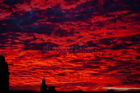Red Bloody Sunset In Cloudy Sky Above The Village Beautiful