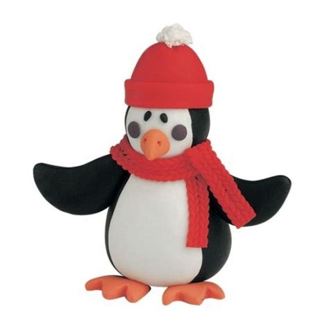Christmas cakes don't need to be boring! Claydough Penguin with Bobble Hat Christmas Cake ...