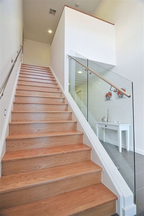 The tile around the downstairs door matches the tile used in the staircase. Stairs | Architecture house, Storey homes, House plans