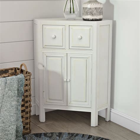 A custom corner vanity and a tall, corner medicine cabinet increased the floor space and storage area in this tiny bathroom. Wayfair Corner Cabinet - FFvfbroward.org