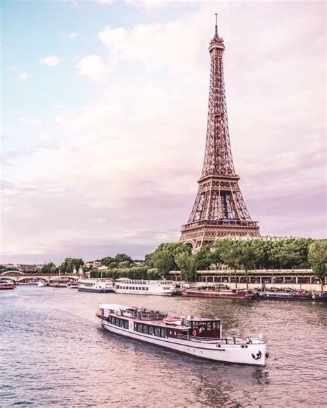 Boat Cruise On The Seine River In Front Of The Eiffel Tower In Paris At