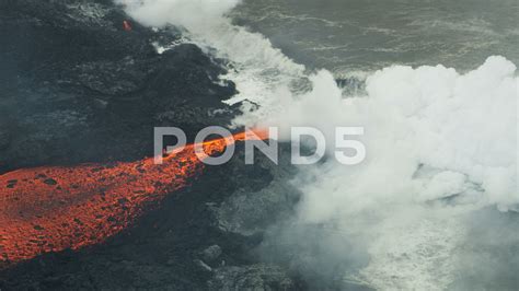Aerial View Volcanic Hot Magma Ocean Steam Rising Stock Footage Ad