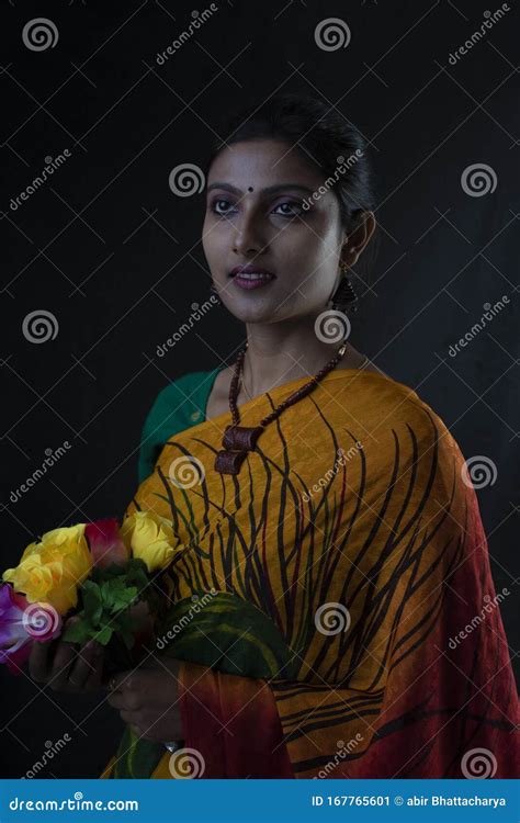 Portrait Of Young Indian Bengali Brunette Woman In Indian Traditional