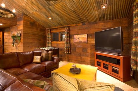 Ceiling fans with caged lighting offer the best of both styles with their unique light kits and rugged wood and metal fan blades. Crosswater Ski Lodge - Rustic - Family Room - Portland ...