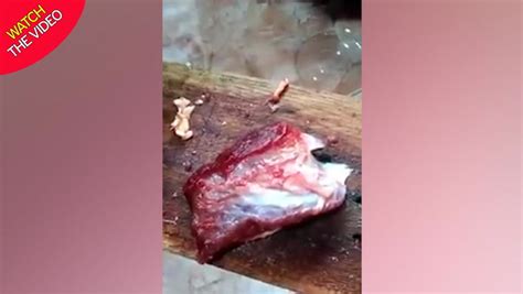 Mystery As Cut Of Raw Zombie Meat Pulsates On Bloodied Chopping Board