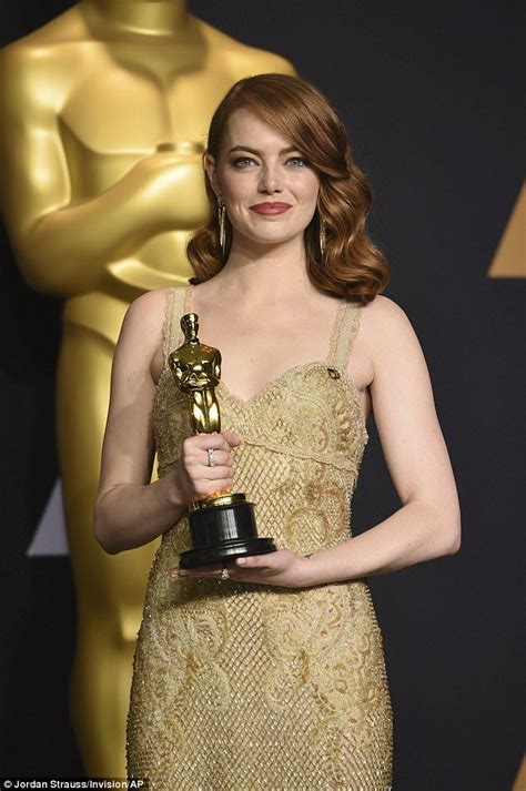 emma stone holds oscar award as best actress for the film la la land during 89th annual