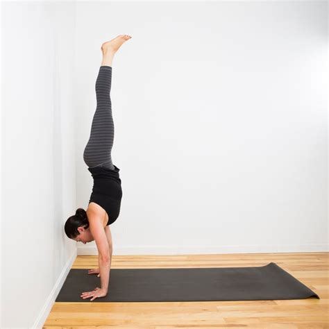 Handstand Against The Wall The Ultimate Yoga Pose To Strengthen Your