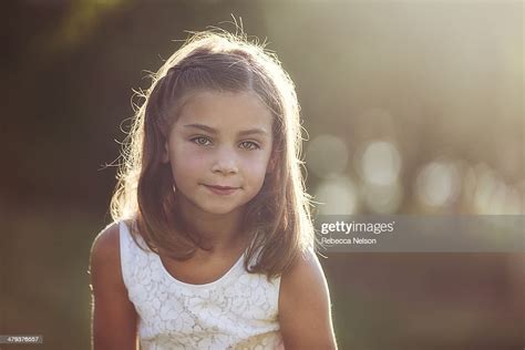 Cute Brown Haired Hazel Eyed Girl At Sunset Photo Getty Images
