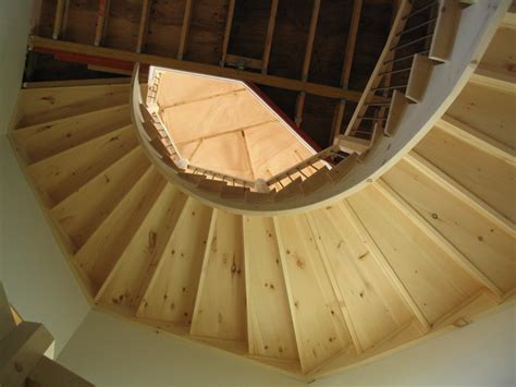 Knotty pine paneling with uv finish. Knotty Pine Custom Staircase - Rustic - Staircase - other metro - by Woodland Stair Works