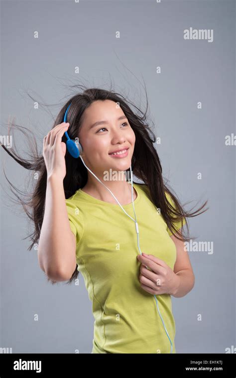 Young Woman Listening To Music Stock Photo Alamy