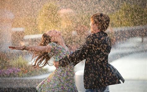 2560x1600 Couple Dance Happiness Rain Wet Love Wallpaper