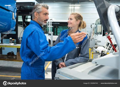 Factory Supervisor Giving Instructions Female Worker Stock Photo By