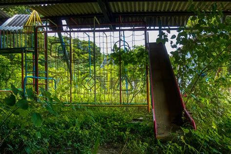 Overgrown Playground Left Untouched At An Abandoned Nursery School R