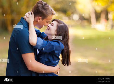 Loving Young Couple Kissing Outdoors Stock Photo Alamy