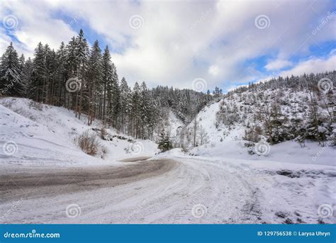 Narrow Winding Mountain Road In Snow Daytime Winter Landscape With