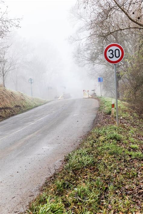 Fog On A Country Road Speed Traffic Sign Dangerous Place Slippery