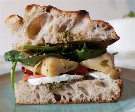 Homemade Sourdough Focaccia Sandwich With Green Pesto Olives