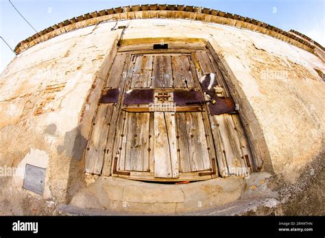 8mm lens capturing a city's heartbeat, buildings stretching into the