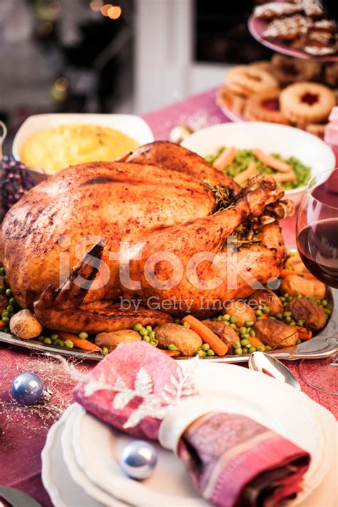 Holiday Dinner With Stuffed Turkey And Side Dishes Stock Photos
