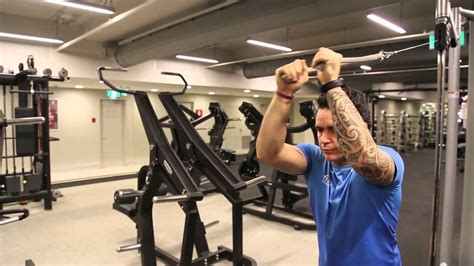 And according to your link, standing overhead extensions target more areas of the tricep than lying down. Biceps - Standing Rope Tricep Extension From A High Cable ...