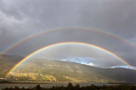Double Rainbow Over Norwegian Landscape Stock Photo Download Image