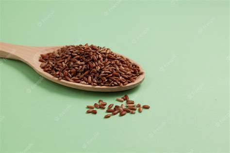Premium Photo Gaba Rice In Wooden Spoon Close Up Germinated Brown Rice