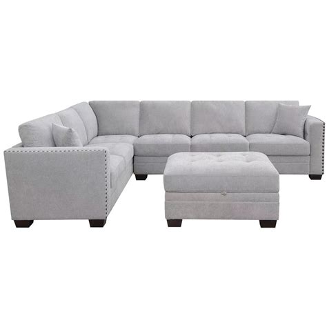 The pieces can be arranged in multiple configurations to suit any room size and it's covered in a cream coloured 100% polyester fabric that offers a soft feel to the touch. Thomasville Fabric Sectional with Storage Ottoman | Costco ...