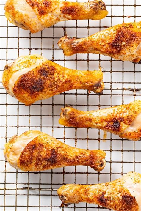 crispy baked chicken legs drumsticks recipe wholesome yum baked chicken legs oven roasted