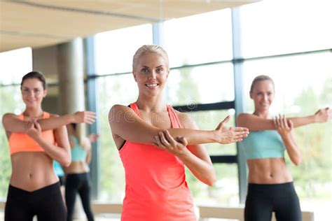 Group Of Women Working Out In Gym Stock Photo Image Of People